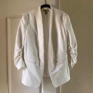 White blazer with rouged sleeve detail